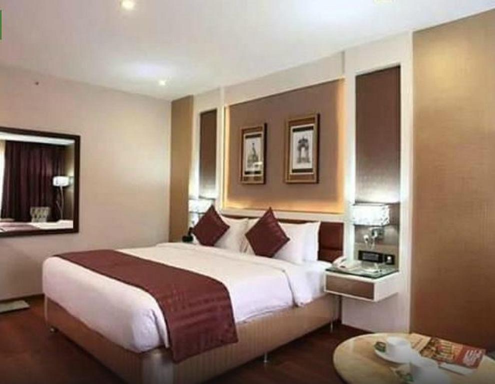 Hotel The Pgs Vedanta Kochi Habitación foto